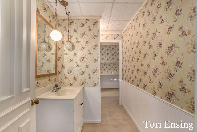 bathroom featuring vanity and crown molding