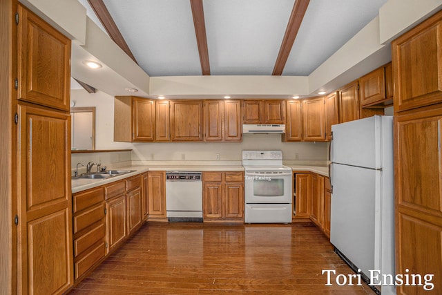 kitchen with lofted ceiling with beams, white appliances, dark hardwood / wood-style floors, and sink