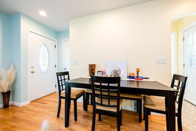 dining room with light hardwood / wood-style flooring