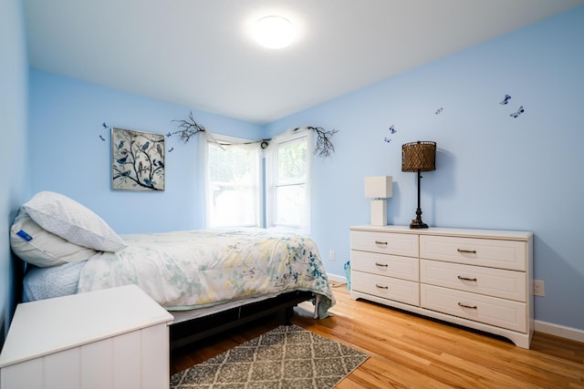 bedroom featuring light wood-type flooring