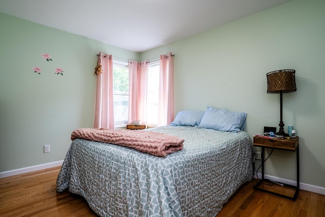 bedroom featuring hardwood / wood-style floors