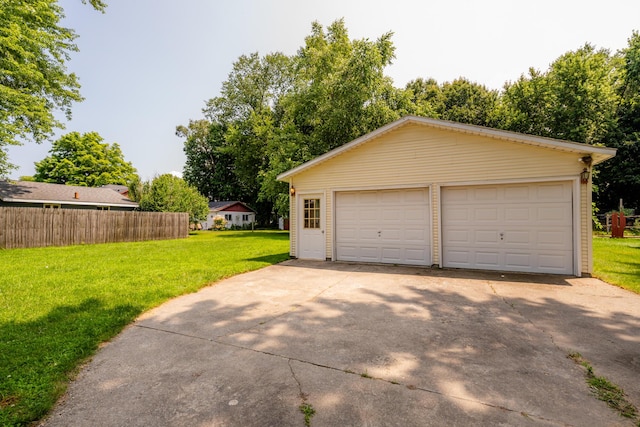 garage with a yard