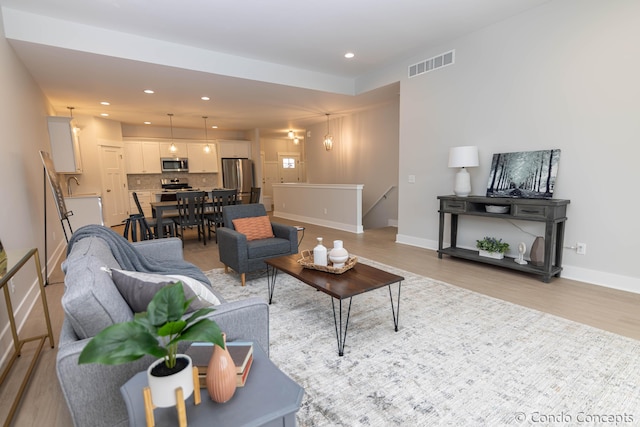 living room featuring light hardwood / wood-style floors