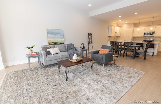 living room featuring light wood-type flooring