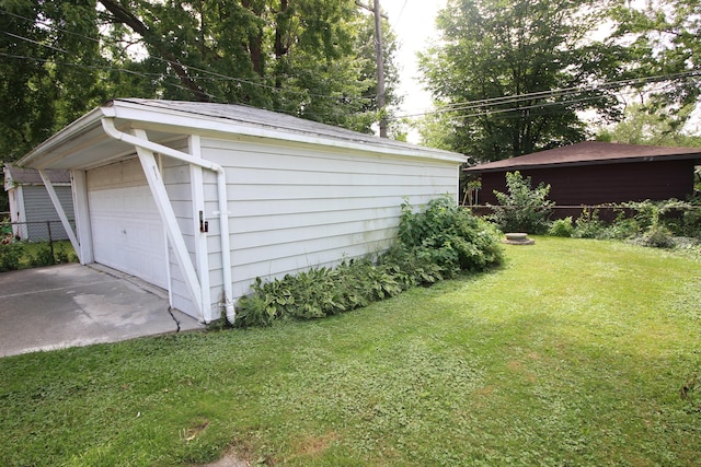 garage with a lawn