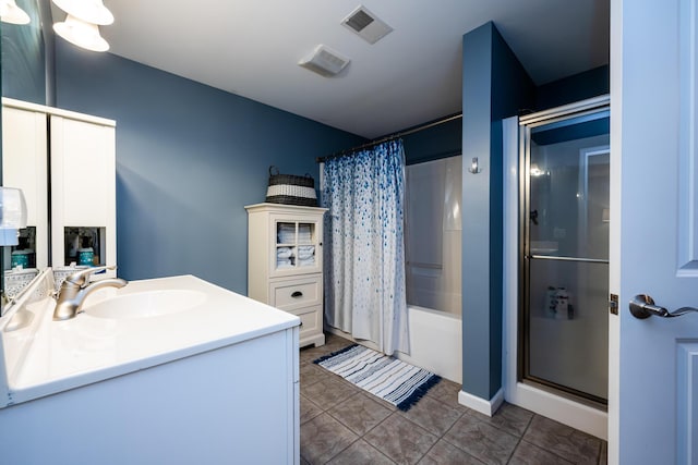 bathroom with vanity, tile patterned floors, and shower / bath combo