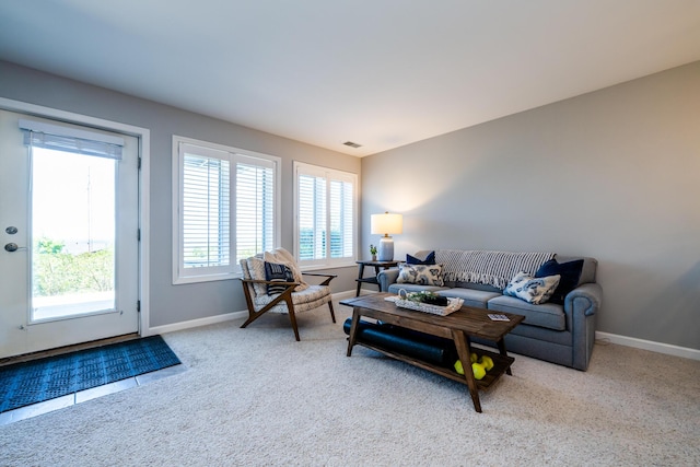 living room with light colored carpet