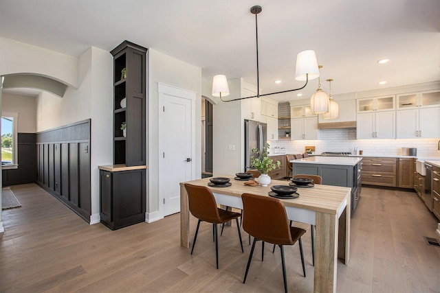 dining space featuring hardwood / wood-style floors