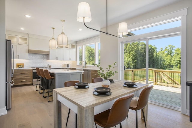 dining room featuring light wood-type flooring