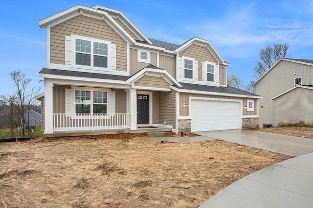 craftsman-style home featuring a porch and a garage