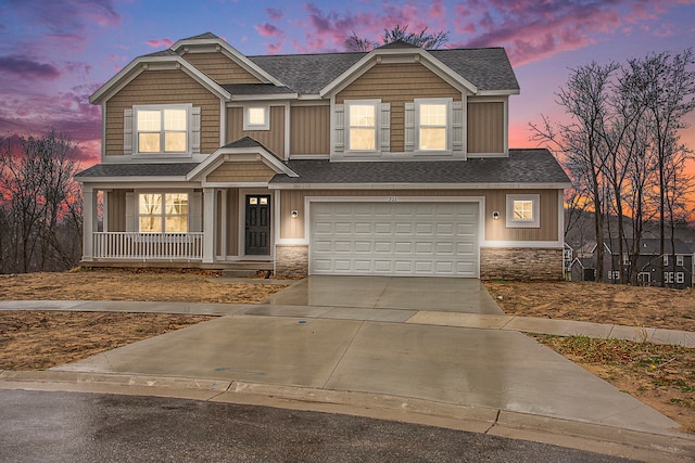 view of front of property with a garage