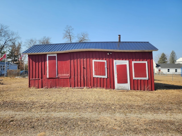 view of outdoor structure with a yard