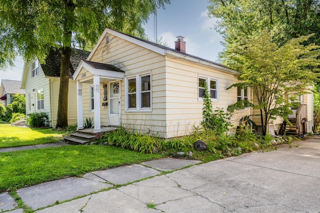 bungalow with a front yard