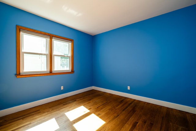 empty room featuring hardwood / wood-style floors