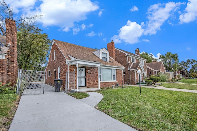 view of front of home featuring a front lawn