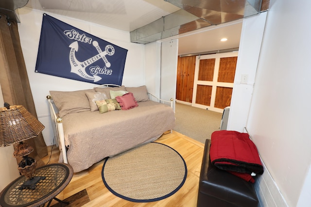 bedroom featuring hardwood / wood-style flooring