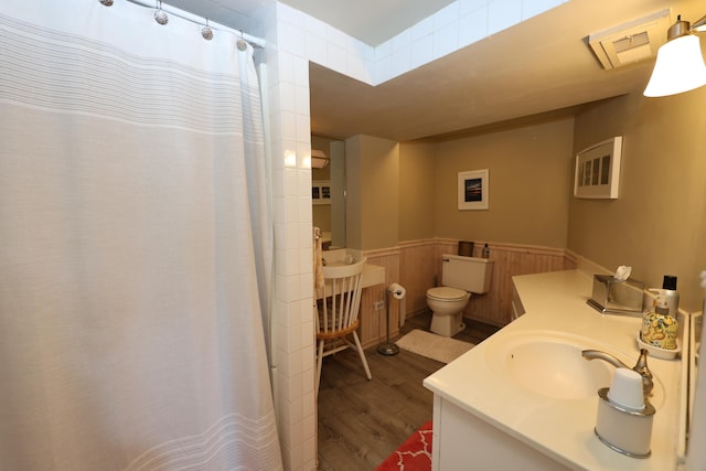 bathroom featuring vanity, toilet, a shower with shower curtain, and hardwood / wood-style flooring