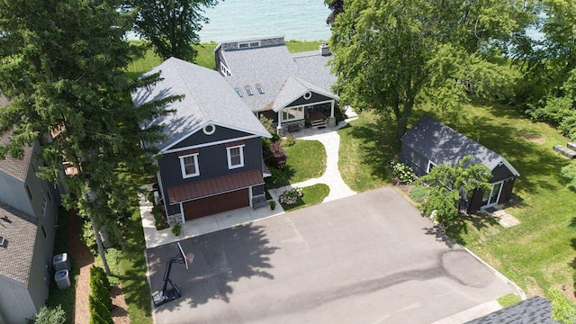 drone / aerial view with a water view