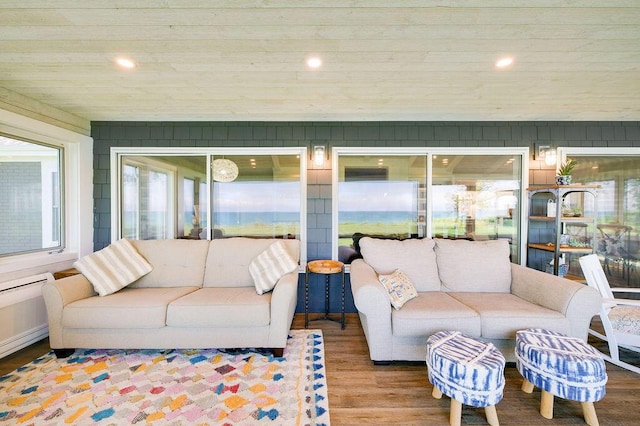 sunroom / solarium featuring wood ceiling