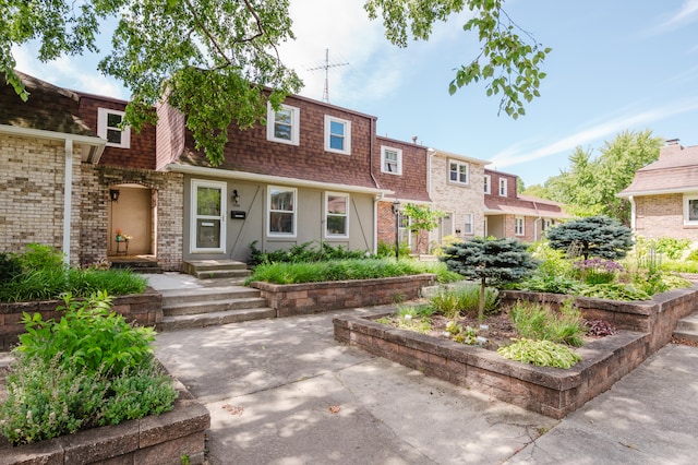 view of front of house with a patio area