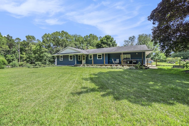 single story home featuring a front yard