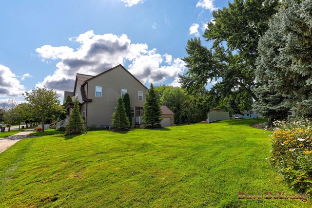 view of side of property featuring a lawn