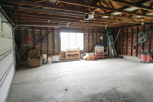 garage featuring a garage door opener