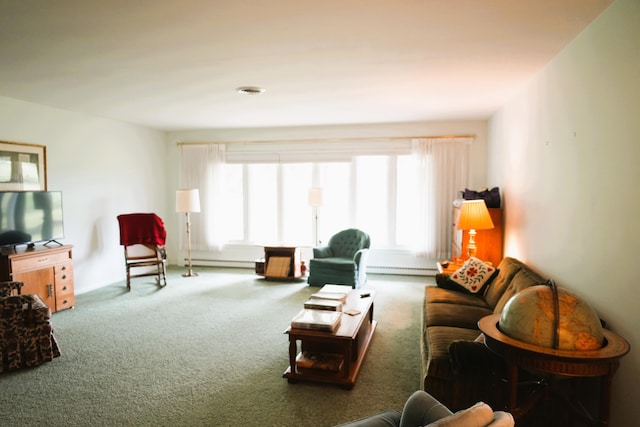 living room with plenty of natural light, carpet floors, and baseboard heating