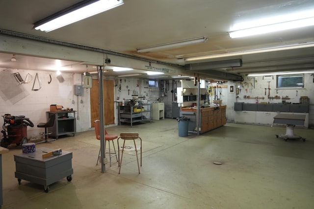 basement with a workshop area