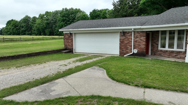 garage with a lawn