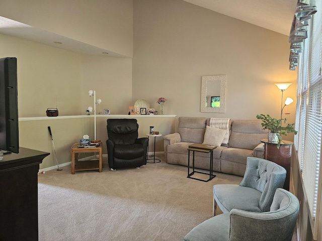 living room featuring light carpet and lofted ceiling