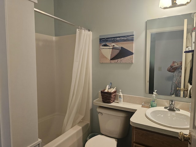 full bathroom with shower / bathtub combination with curtain, vanity, and toilet