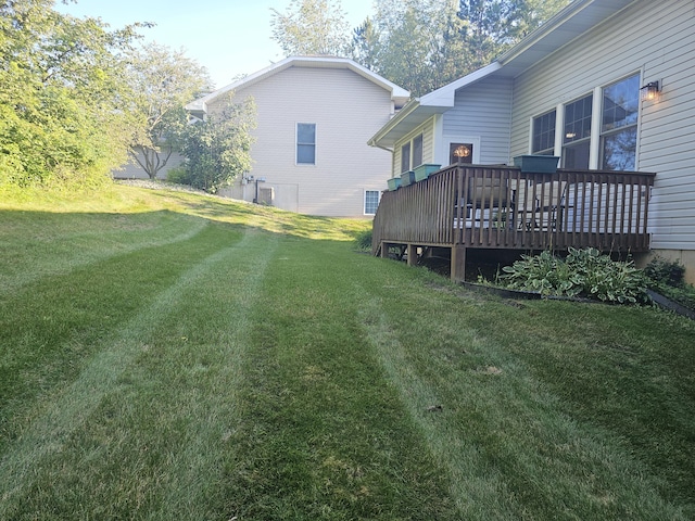 view of yard featuring a deck