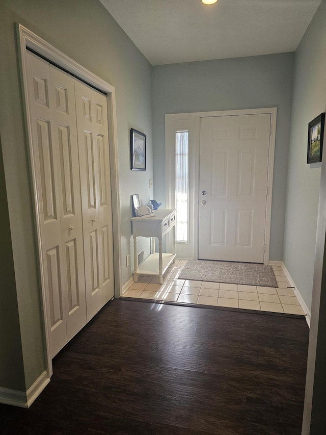 entrance foyer with hardwood / wood-style floors