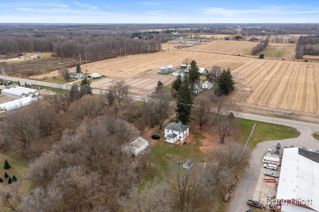 birds eye view of property featuring a rural view