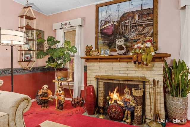 interior space with a fireplace and crown molding