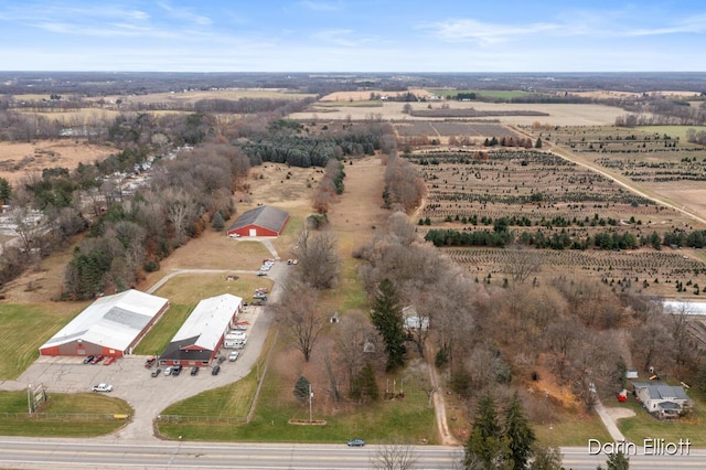 birds eye view of property featuring a rural view