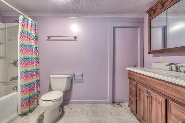 full bathroom with vanity, toilet, a textured ceiling, and shower / bath combo