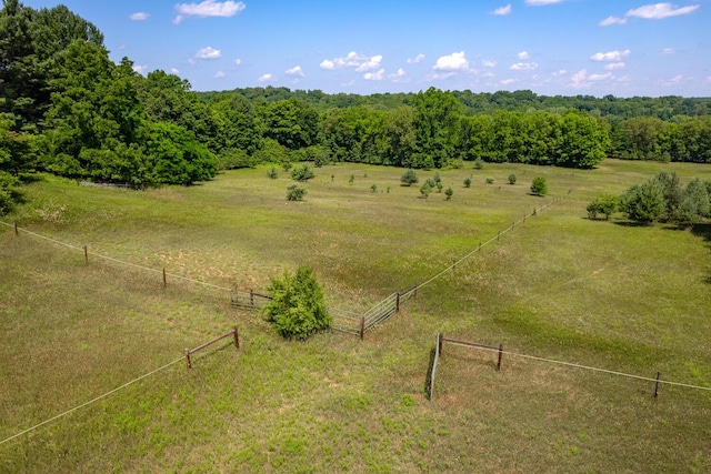 birds eye view of property featuring a rural view