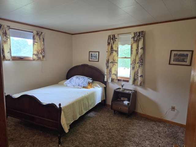 carpeted bedroom featuring ornamental molding