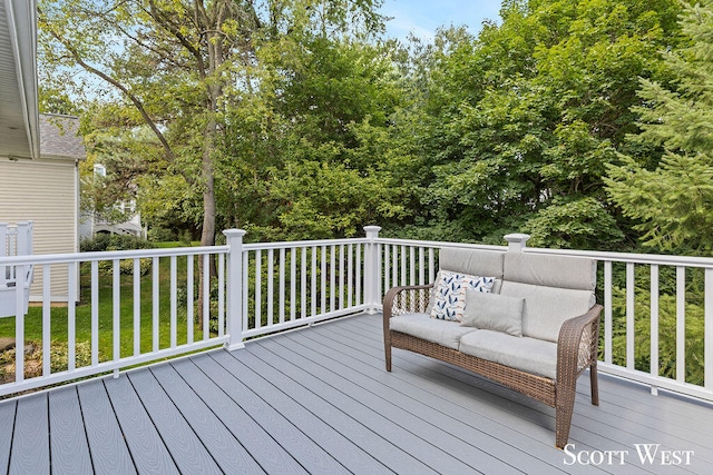 wooden terrace featuring outdoor lounge area