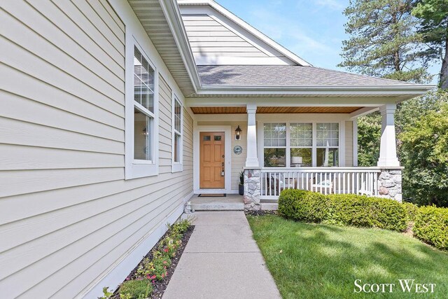 entrance to property with a porch