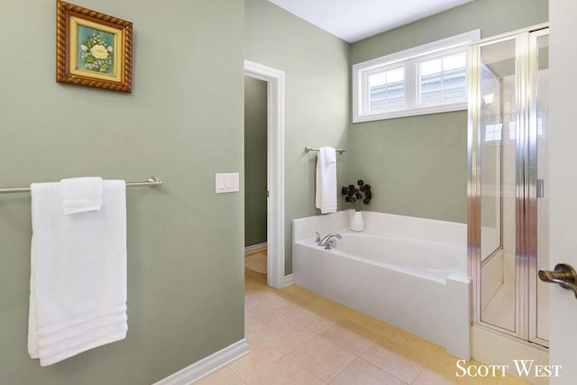 bathroom with separate shower and tub and tile patterned floors