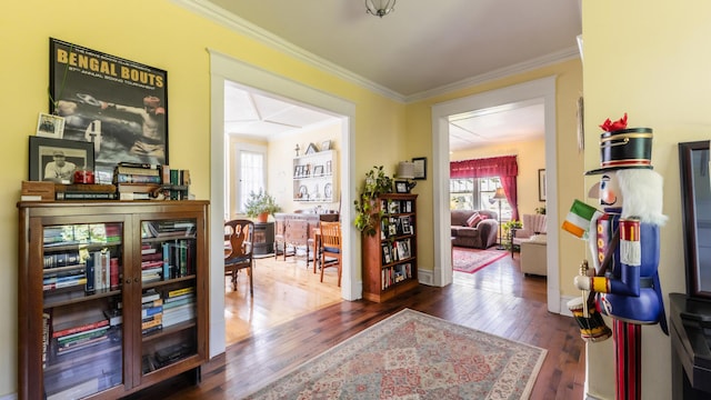 hall featuring dark hardwood / wood-style floors and ornamental molding