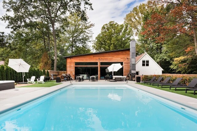 15963 Lakeshore Rd, Union Pier, MI 49129 - view of swimming pool with a fenced in pool, an outdoor living space, a patio area, and fence