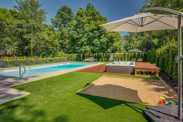 15963 Lakeshore Rd, Union Pier, MI 49129 - view of pool featuring a fenced in pool, fence, and a lawn