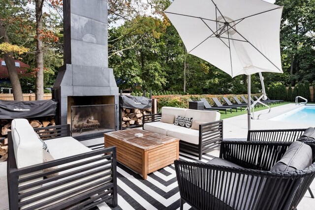 15963 Lakeshore Rd, Union Pier, MI 49129 - wooden terrace featuring a fenced in pool, a patio, an outdoor living space with a fireplace, and fence
