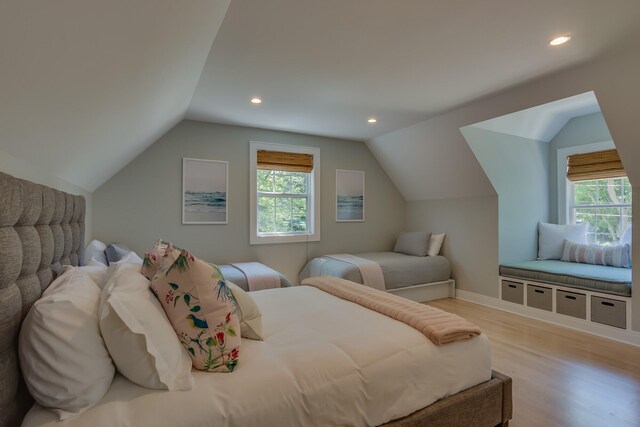 15963 Lakeshore Rd, Union Pier, MI 49129 - bedroom featuring recessed lighting, light wood-style flooring, multiple windows, and vaulted ceiling