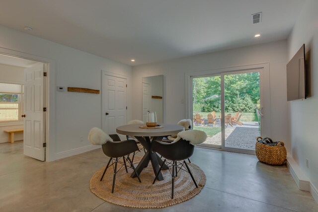 15963 Lakeshore Rd, Union Pier, MI 49129 - dining area featuring concrete flooring, visible vents, baseboards, and recessed lighting