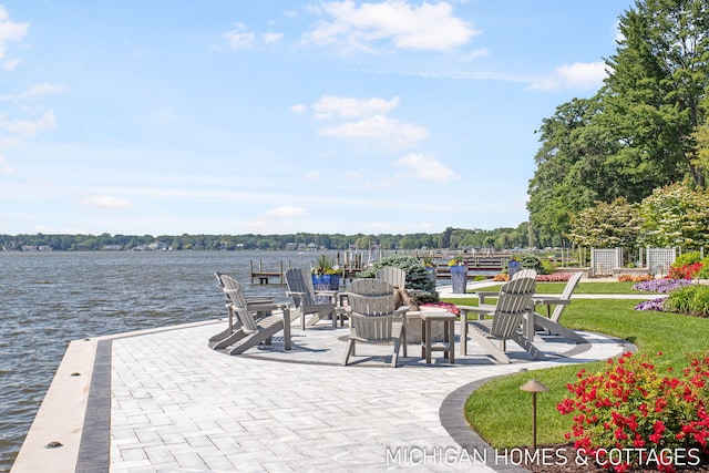 view of patio / terrace with a water view